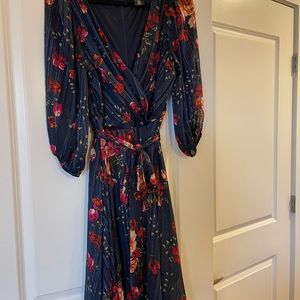 Blue floral wrap lined dress from DKNY.  Size 14.   Belted.